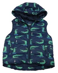 Tmavomodrá šusťáková zateplená vesta s krokodýly a kapucí Primark