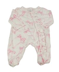 Bílý overal s mašlemi 