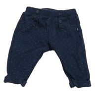 Tmavomodré puntíkované tepláky Obaibi 