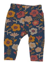 Tmavomodré tepláky s kytičkami M&Co.