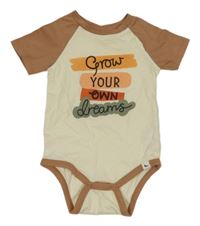 Smetanovo-pískové body s nápisem 