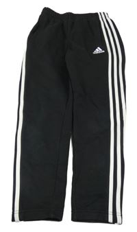Černé tepláky s pruhy a logem Adidas