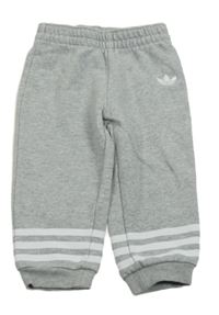 Světlešedé tepláky s pruhy a logem Adidas