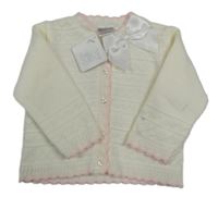 Nové - Bílo-růžový propínací svetr s mašlí