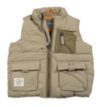 Hnědá šusťáková zateplená vesta s kapsami Next