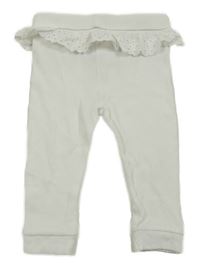 Bílé žebrované tepláky s madeirovým volánkem River Island