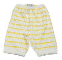 Bílo-žluté vzorované tepláky