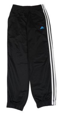 Černo-bílé sportovní tepláky s pruhy a logem Adidas