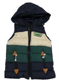 Tmavomodro-smetanovo-zelená šusťáková zateplená vesta s nášivkou a kapucí 