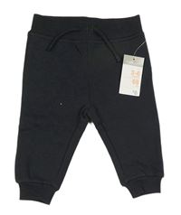 Černé tepláky Primark