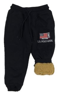 Tmavomodré zateplené tepláky s vlajkou U.S. POLO ASSN