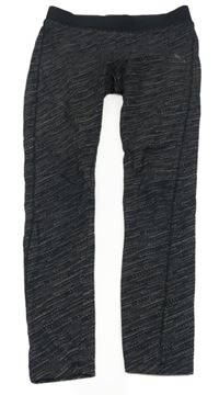 Černé puntíkaté legíny Decathlon