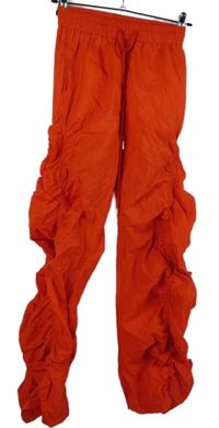 Dámské červené šusťákové řasené volné kalhoty Shein 