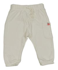 Bílé tepláky s kapsou Impidimpi