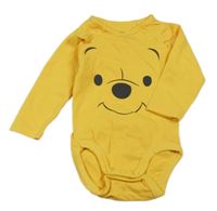 Tmavožluté body s Pú H&M