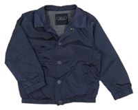 Tmavomodrá šusťáková jarní bunda Next