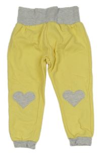 Šedo-žluté tepláky se srdíčky Lupilu
