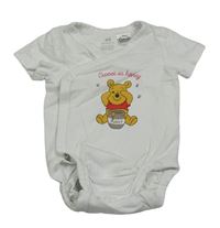 Bílé zavinovací body s medvíkem Pú H&M