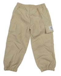 Béžové cargo šusťákové kalhoty s nášivkou 