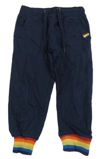 Tmavomodré tepláky s barevným lemem 