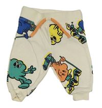 Krémové tepláky s příšerkami Primark