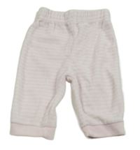 Růžovo-bílé pruhované sametové tepláky 