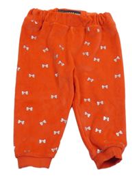 Červené plyšové kalhoty s mašličkami Guess