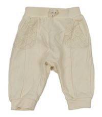 Pudrové tepláky s madeirou George 