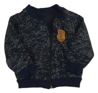 Tmavomodrá skvrnitá propínací teplá mikina s nášivkou 