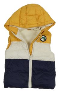 Hořčicovo-smetanovo-tmavomodrá šusťáková zateplená vesta s nášivkou a kapucí Dunnes