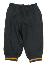 Tmavošedé šusťákové podšité kalhoty