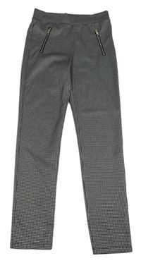 Černo-bílé kostkované tregíny se zipy