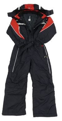 Tmavomodro-červeno-bílá šusťáková zimní kombinéza s odepínací kapucí a páskem BRUGI