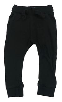 Černé tepláky Next