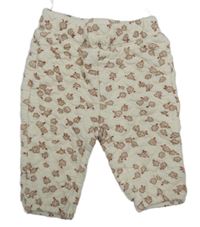 Smetanové květované prošívané tepláky C&A