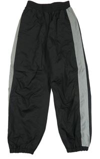 Černo-šedé šusťákové cuff kalhoty s pruhy TCM 