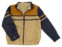 Béžovo-medovo-tmavomodrá šusťáková zateplená bunda s pruhy a ukrývací kapucí 