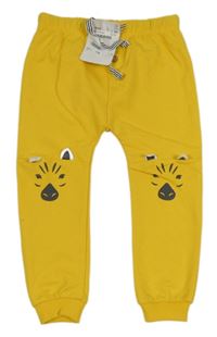 Nové - Žluté tepláky se zebrami Mayoral