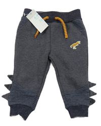Nové - tmavomodré melírované tepláky s dinosaurem a ostny PRIMARK