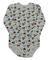 Bílé body s Mickeym a nápisy Disney