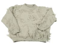 Béžový oversize svetr s třásněmi 