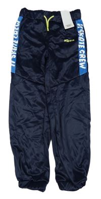 Nové - tmavomodré sportovní tepláky s nápisem 