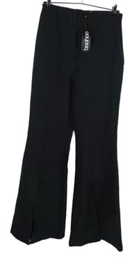 Nové - Dámské černé zvonové kalhoty s rozparky Boohoo 