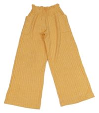 Oranžové žebrované pletené culottes kalhoty Manor