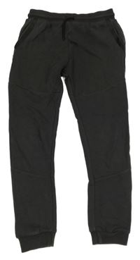 Tmavošedé tepláky s proužky