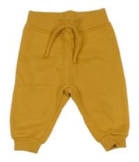 Okrové tepláky Primark