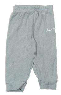 Olivovošedé melírované tepláky s logem Nike