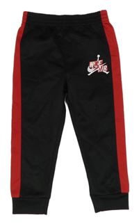 Červeno-černé sportovní tepláky s logem Nike Air Jordan