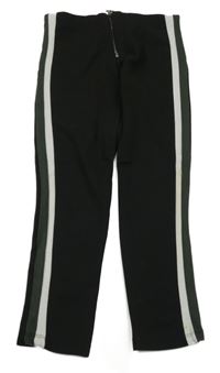 Černé tregíny se zipem a pruhy Zara