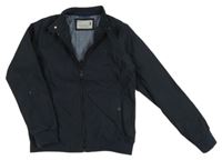 Tmavomodrá šusťáková jarní bunda s výšivkou Next